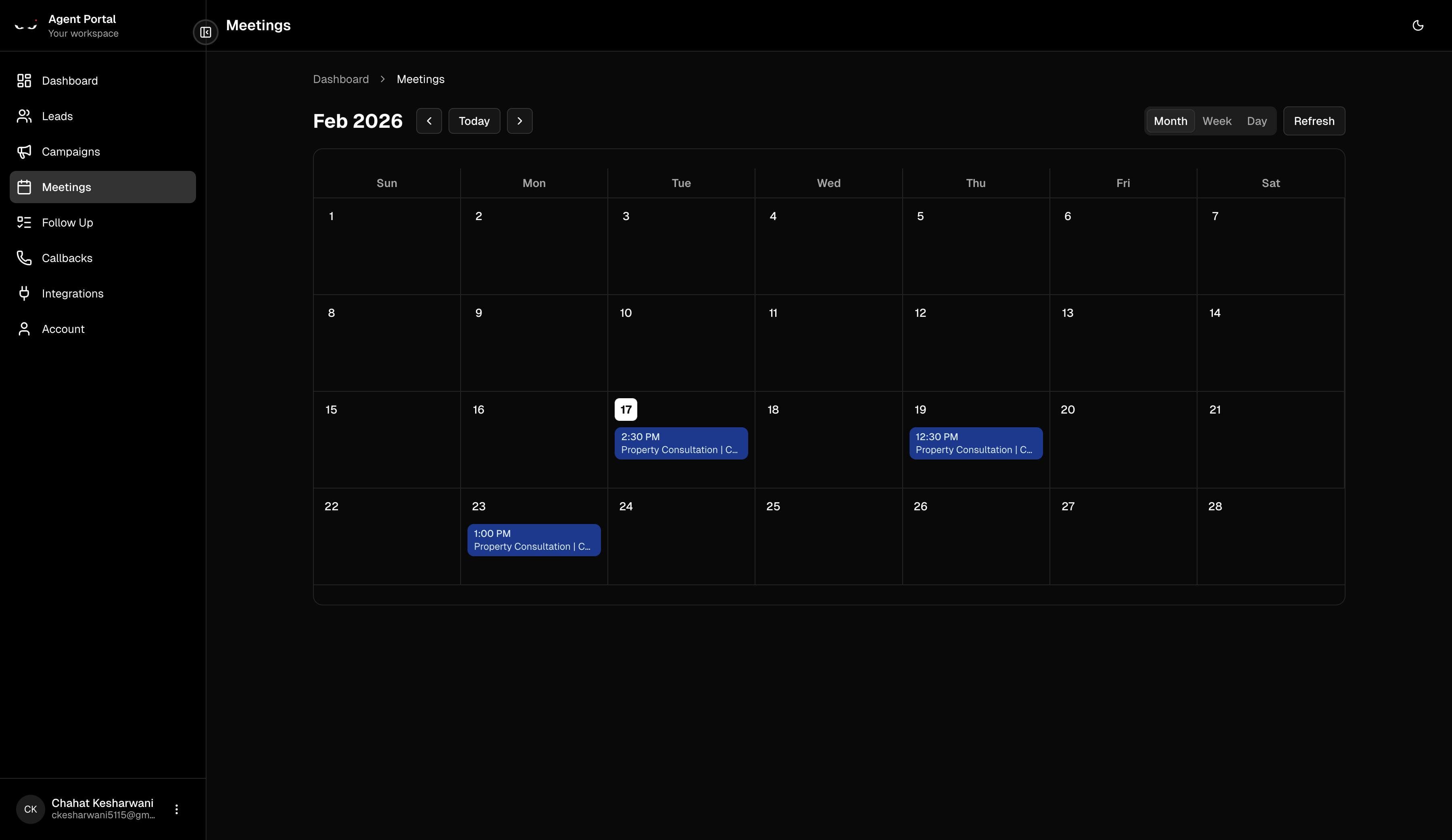 Calendar month view with scheduled meetings